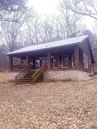 4 Acres of Residential Land with Home for Sale in Clarksville, Arkansas