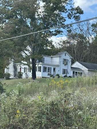 47.1 Acres of Agricultural Land with Home for Sale in Russellville, Tennessee