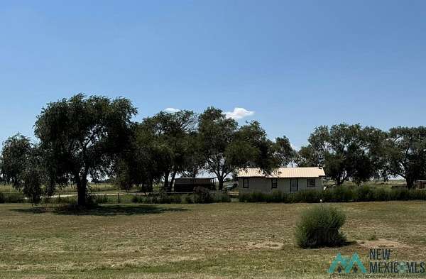 4.73 Acres of Residential Land with Home for Sale in Portales, New Mexico