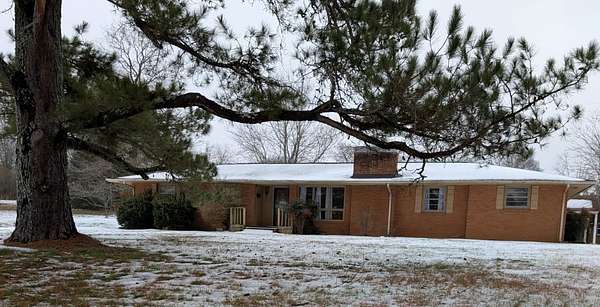 6.3 Acres of Residential Land with Home for Sale in Charlotte, Tennessee