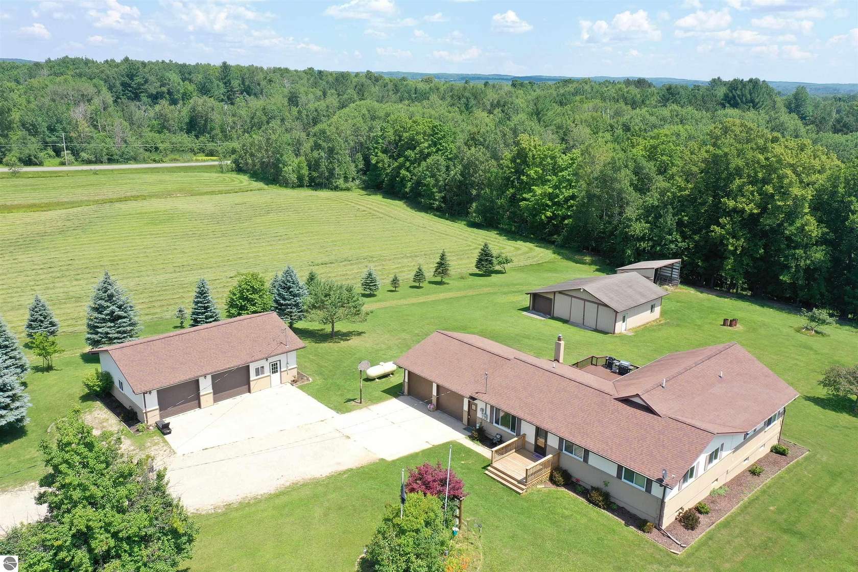 16.6 Acres of Land with Home for Sale in Rose City, Michigan