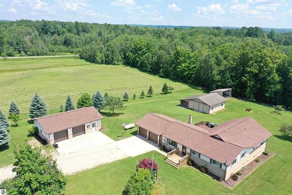 16.6 Acres of Land with Home for Sale in Rose City, Michigan