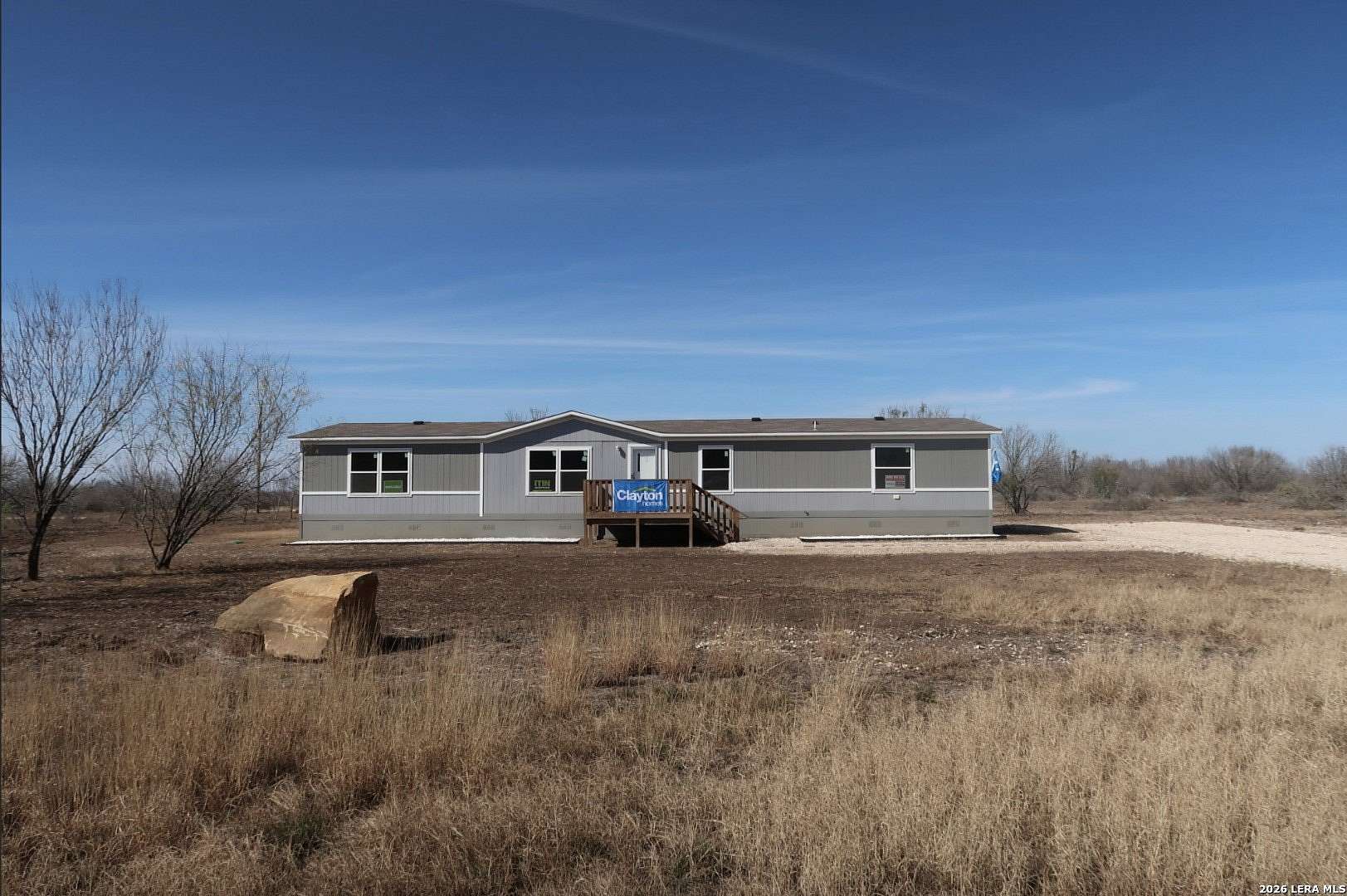 1.55 Acres of Residential Land with Home for Sale in Moore, Texas