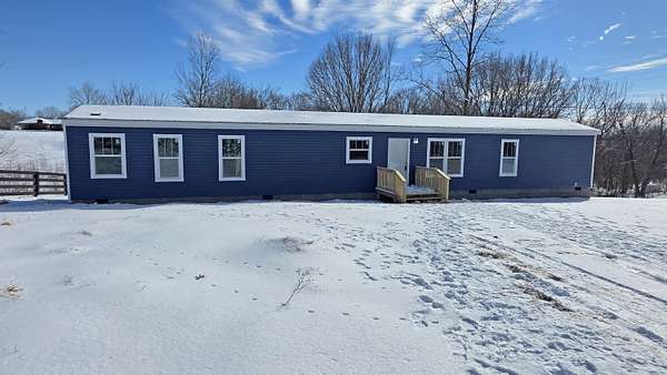 2.1 Acres of Residential Land with Home for Sale in Lawrenceburg, Kentucky