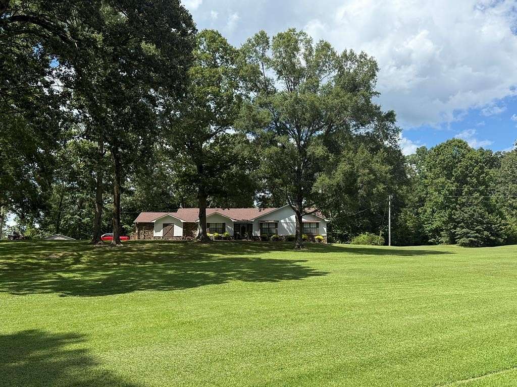 7 Acres of Land with Home for Sale in Bruce, Mississippi