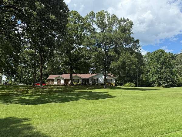 7 Acres of Land with Home for Sale in Bruce, Mississippi