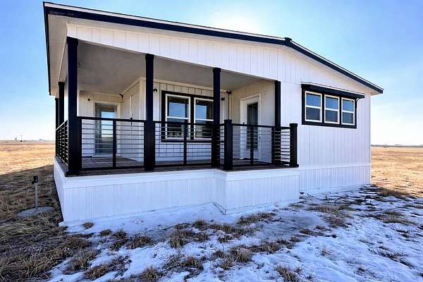 5 Acres of Residential Land with Home for Sale in Abernathy, Texas