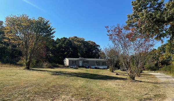 6.7 Acres of Residential Land with Home for Sale in Columbia, Tennessee
