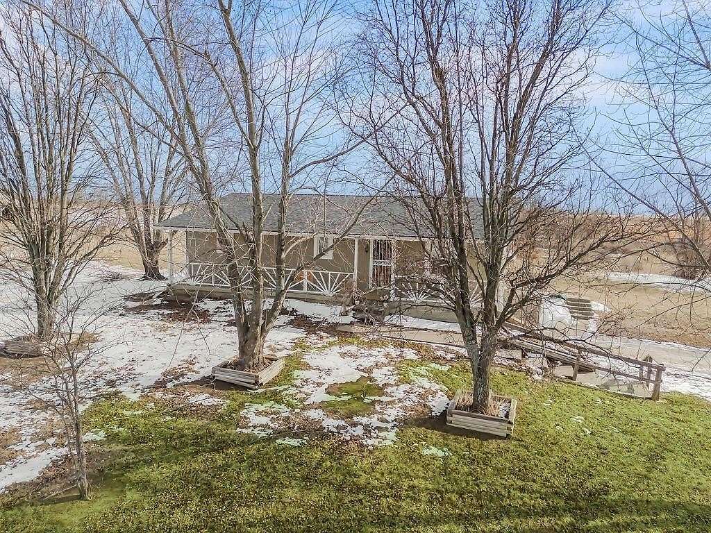 5 Acres of Land with Home for Sale in Garden City, Missouri