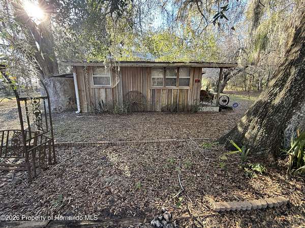 2.3 Acres of Residential Land with Home for Sale in Brooksville, Florida