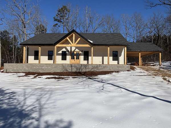 5 Acres of Residential Land with Home for Sale in Evening Shade, Arkansas