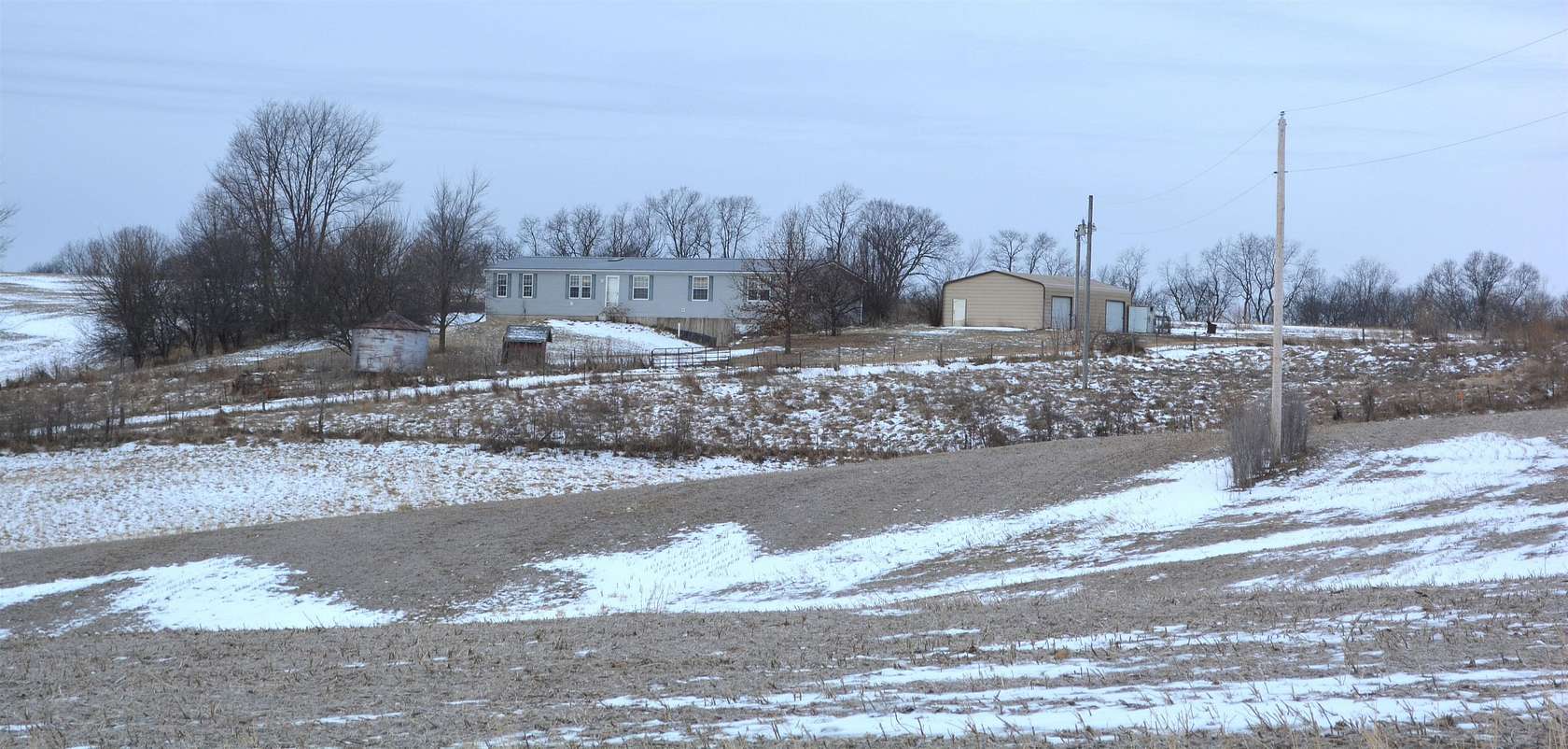 6.73 Acres of Land with Home for Sale in Spragueville, Iowa