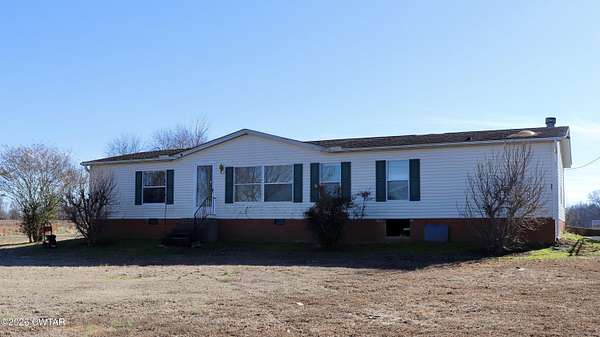 1.9 Acres of Residential Land with Home for Sale in Humboldt, Tennessee