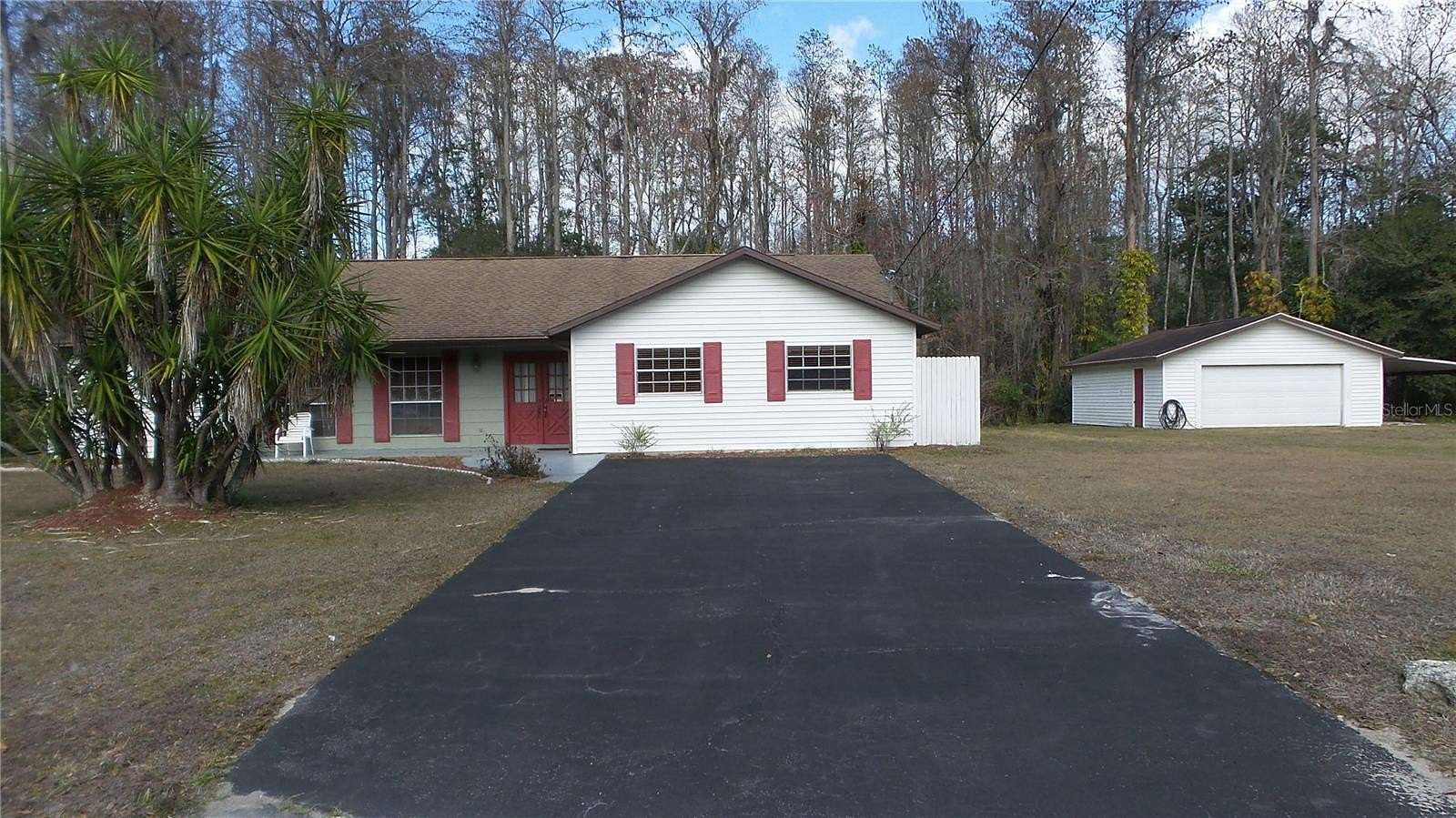 2.69 Acres of Residential Land with Home for Sale in New Port Richey, Florida