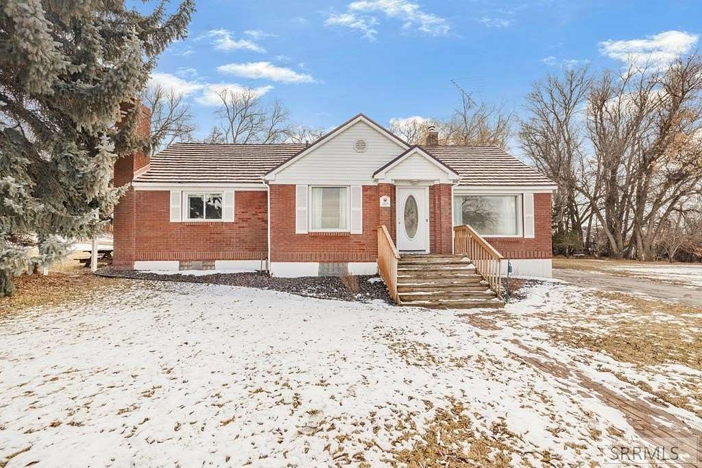 3.85 Acres of Residential Land with Home for Sale in Sugar City, Idaho