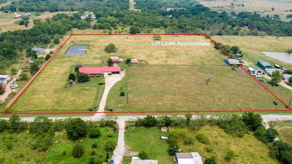 8.43 Acres of Residential Land with Home for Sale in Scurry, Texas