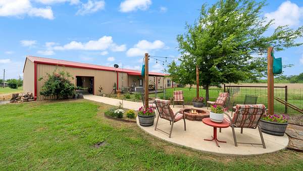 8.43 Acres of Land with Home for Sale in Scurry, Texas