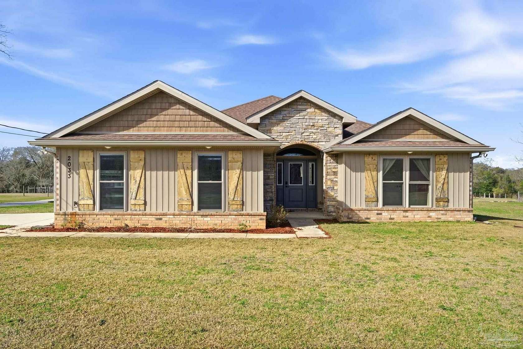 4 Acres of Residential Land with Home for Sale in Cantonment, Florida