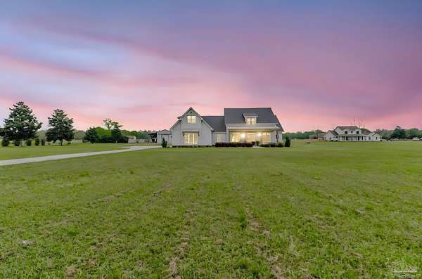 4.54 Acres of Land with Home for Sale in Molino, Florida