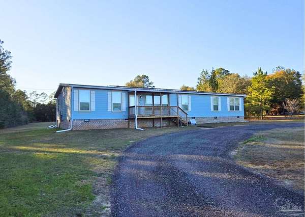 2.42 Acres of Residential Land with Home for Sale in Milton, Florida