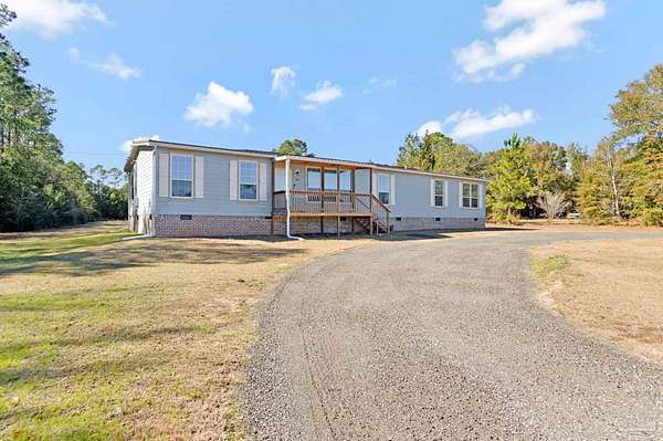 2.42 Acres of Residential Land with Home for Sale in Milton, Florida