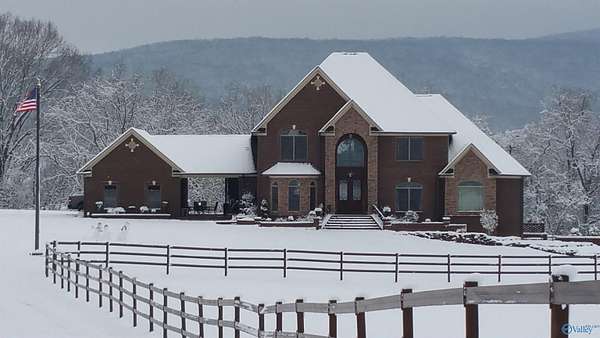 6.6 Acres of Residential Land with Home for Sale in New Market, Alabama