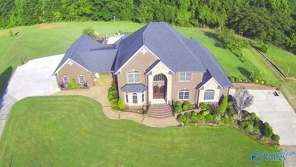 6.6 Acres of Land with Home for Sale in New Market, Alabama