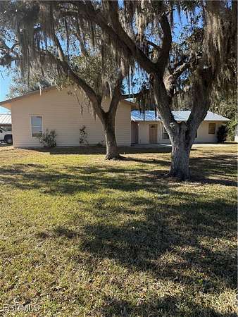 10.5 Acres of Land with Home for Sale in Moore Haven, Florida