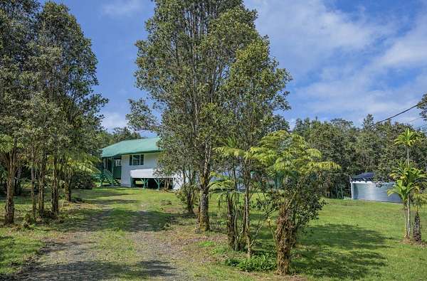 1.5 Acres of Residential Land with Home for Sale in Volcano, Hawaii