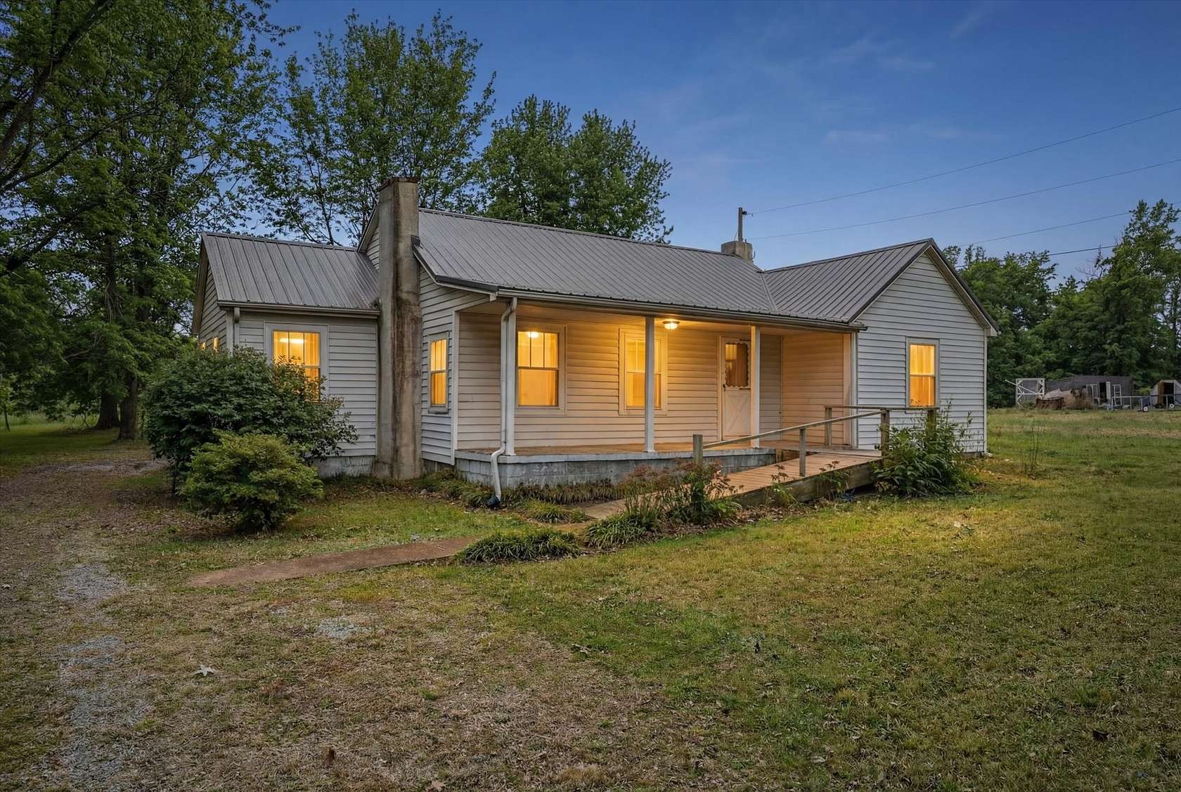 12.3 Acres of Land with Home for Sale in Woodlawn, Tennessee