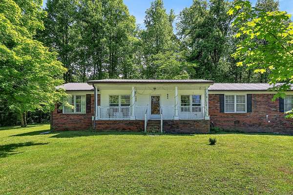 5.7 Acres of Land with Home for Sale in McMinnville, Tennessee