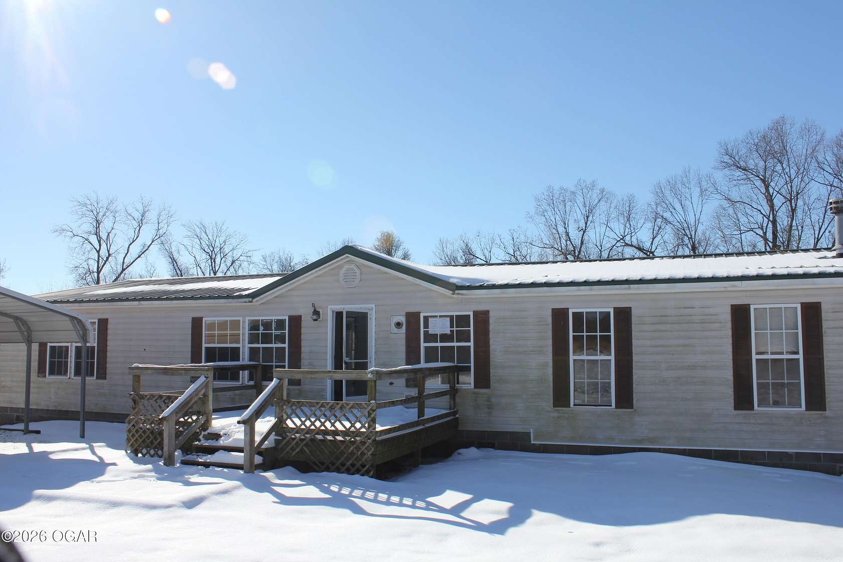 10 Acres of Residential Land with Home for Sale in Goodman, Missouri