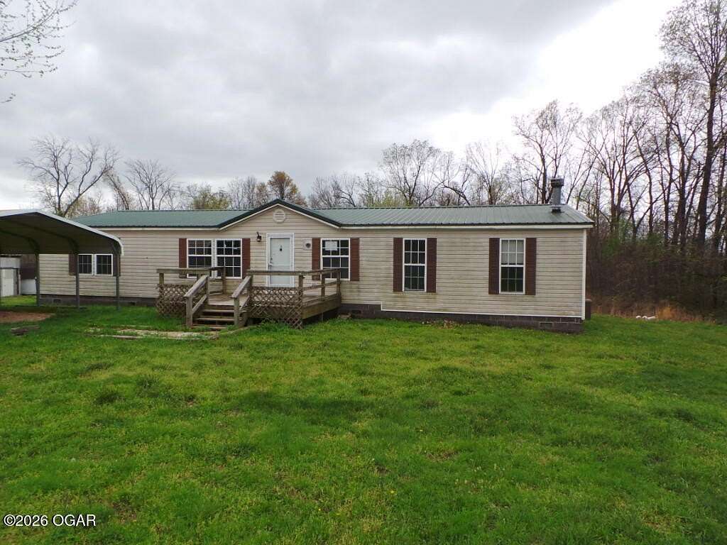 10 Acres of Land with Home for Sale in Goodman, Missouri