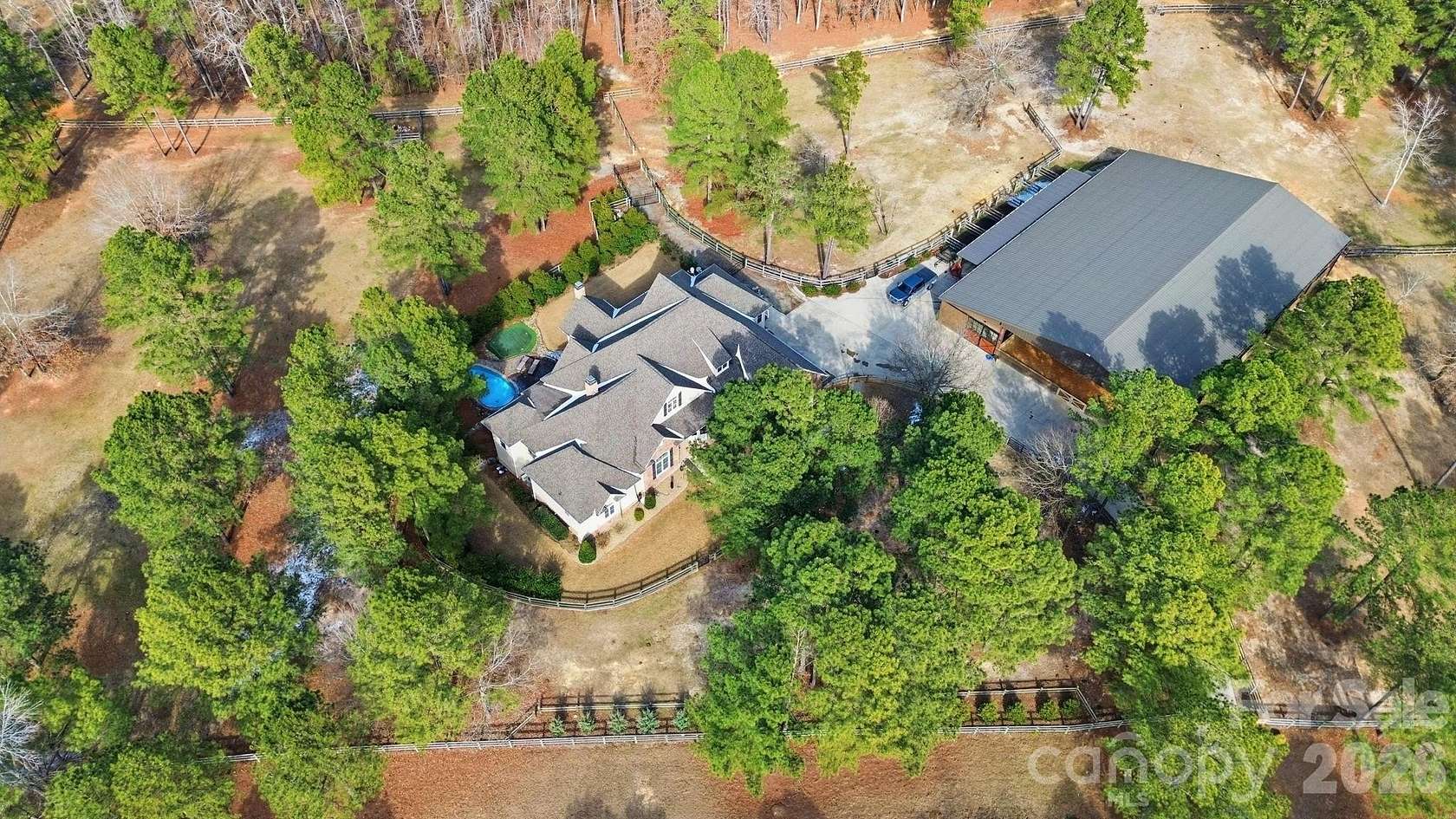 7.12 Acres of Land with Home for Sale in West End, North Carolina