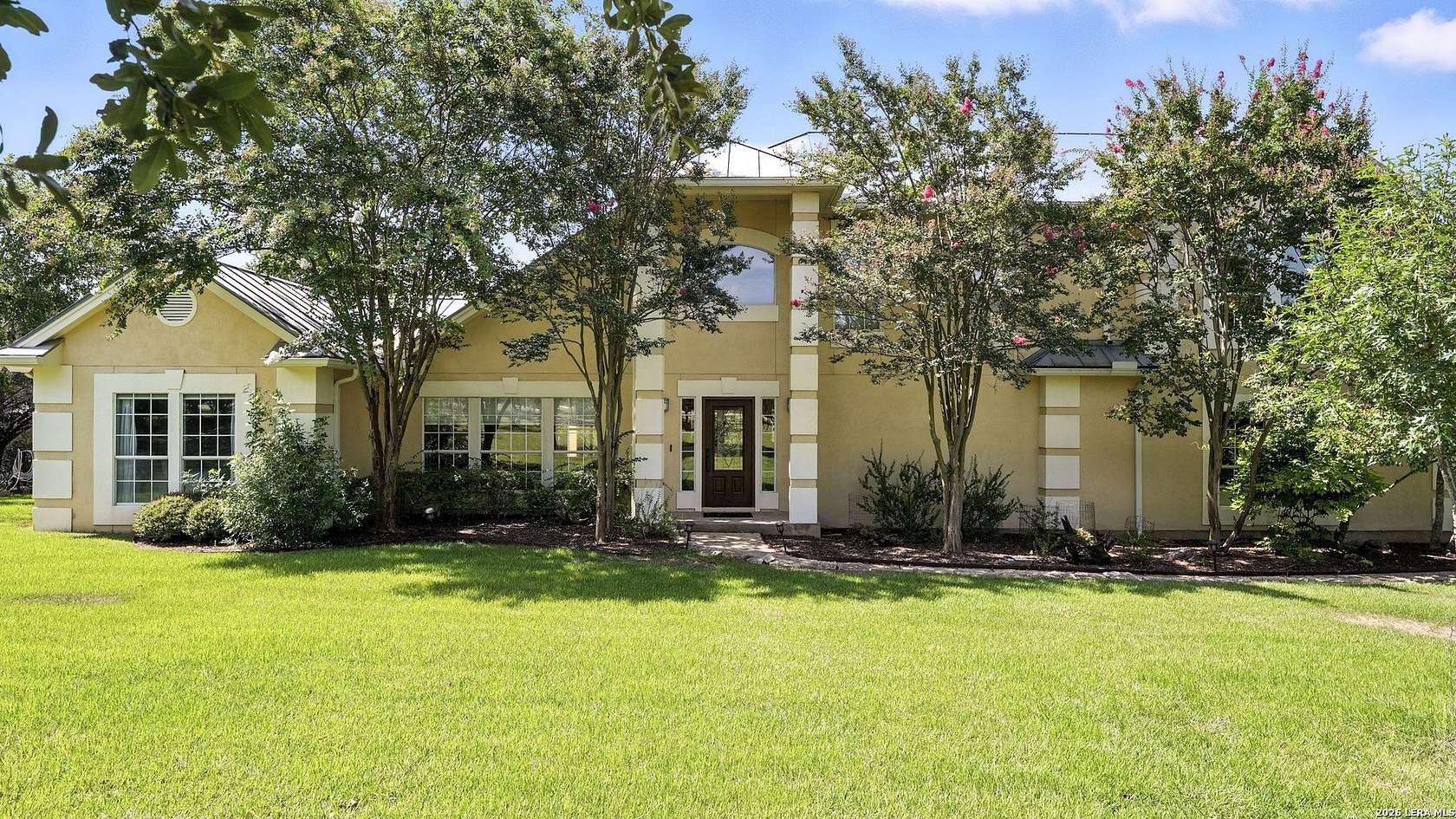 5 Acres of Residential Land with Home for Sale in Canyon Lake, Texas