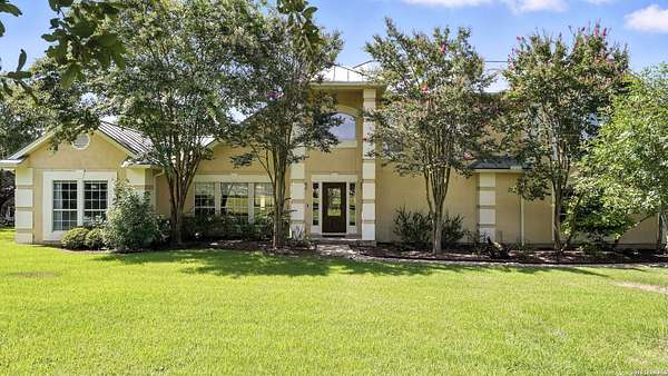 5 Acres of Residential Land with Home for Sale in Canyon Lake, Texas