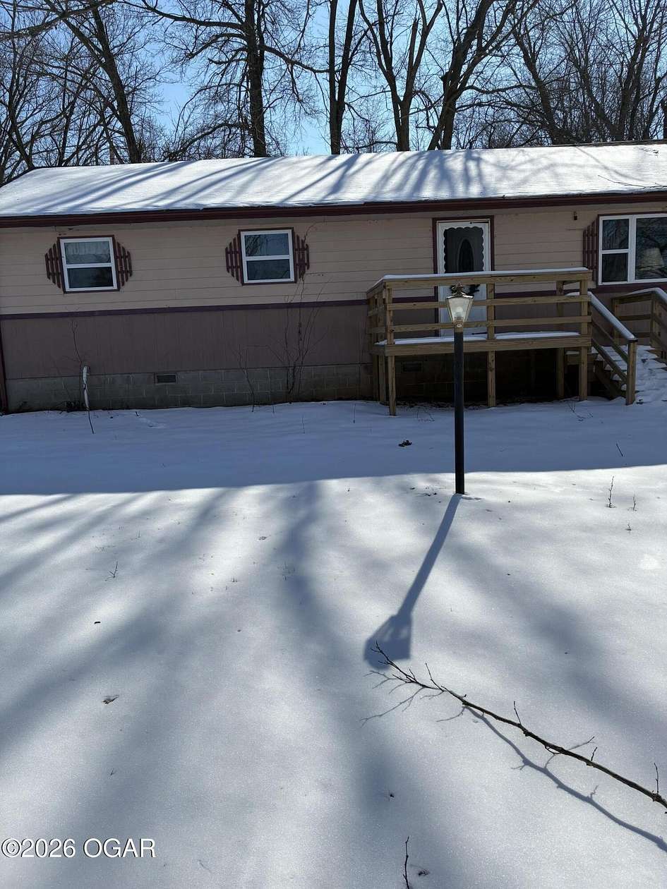 6 Acres of Residential Land with Home for Sale in Diamond, Missouri