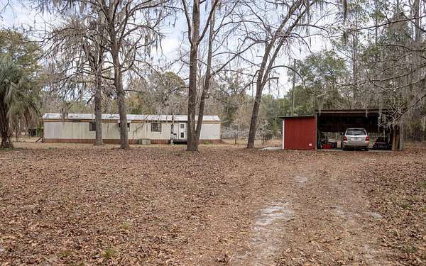 2.2 Acres of Residential Land with Home for Sale in Live Oak, Florida