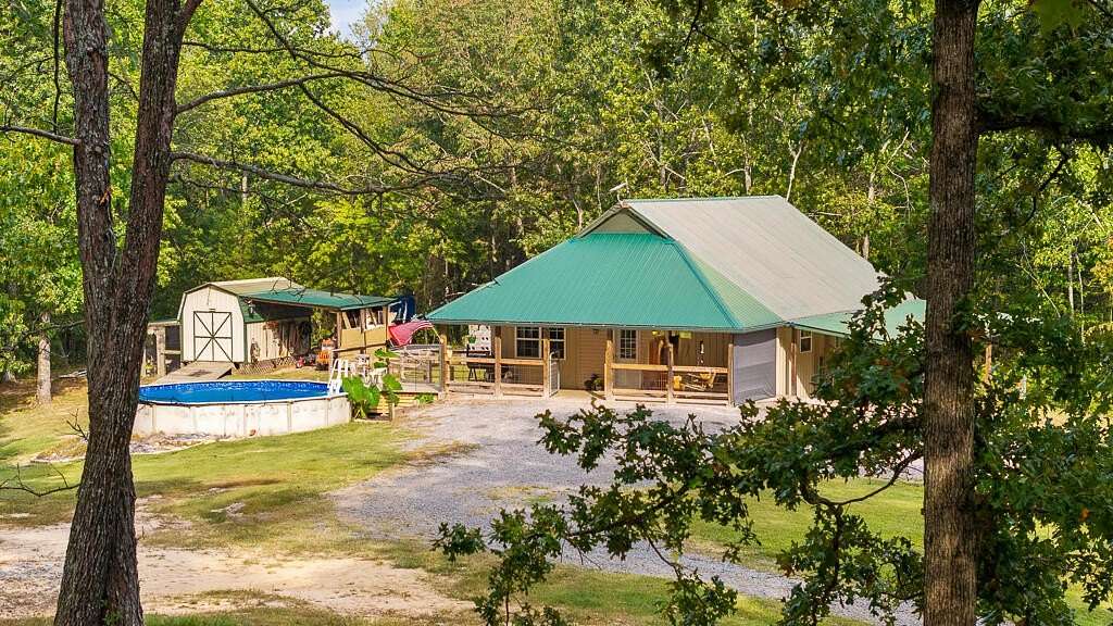 5.75 Acres of Land with Home for Sale in Oldfort, Tennessee