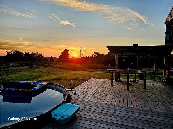 13.8 Acres of Land with Home for Sale in Western Grove, Arkansas