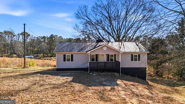 4.69 Acres of Land with Home for Sale in Dacula, Georgia