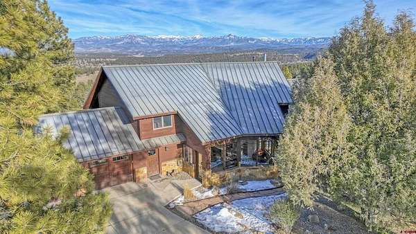 5.2 Acres of Residential Land with Home for Sale in Pagosa Springs, Colorado