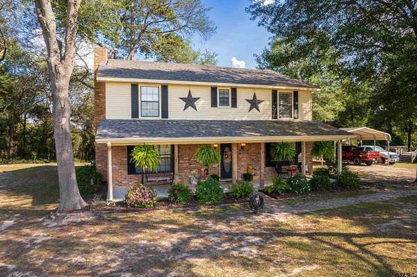 1.56 Acres of Land with Home for Sale in Scroggins, Texas