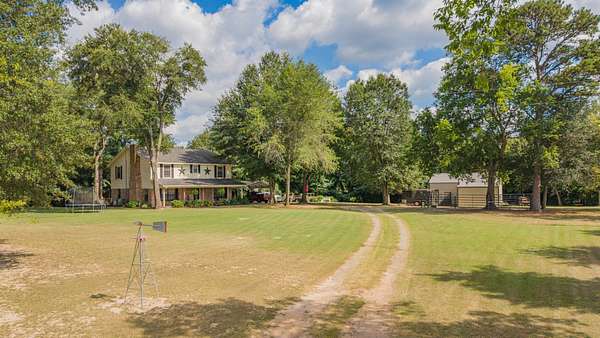 1.56 Acres of Land with Home for Sale in Scroggins, Texas