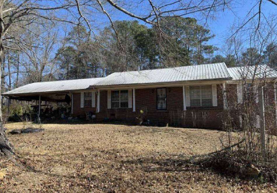 2.5 Acres of Land with Home for Auction in Pell City, Alabama