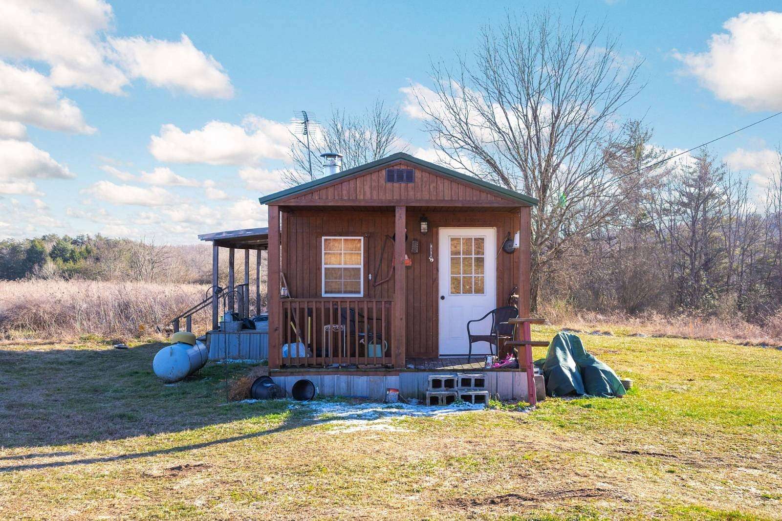 7 Acres of Residential Land with Home for Sale in Graysville, Tennessee