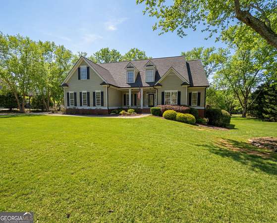 1.66 Acres of Land with Home for Sale in Sharpsburg, Georgia