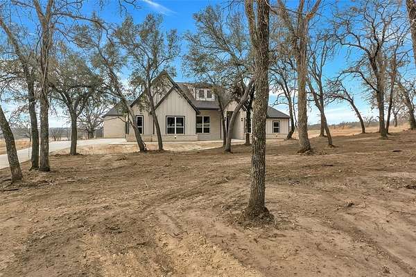 1.9 Acres of Residential Land with Home for Sale in Poolville, Texas