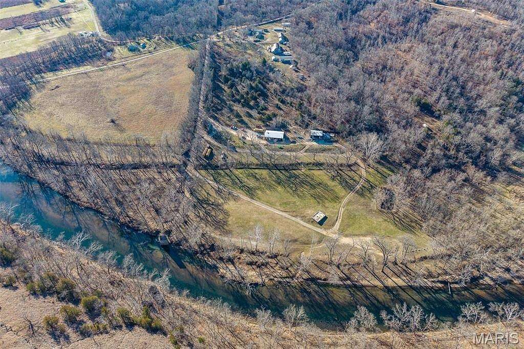 46.5 Acres of Recreational Land with Home for Sale in Lebanon, Missouri