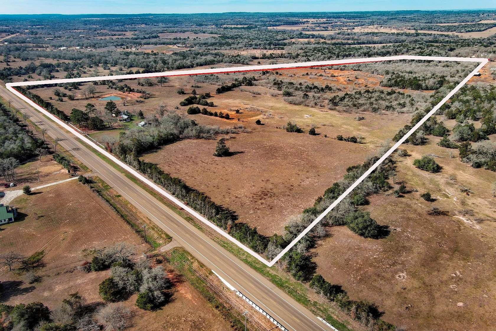 70.9 Acres of Land with Home for Sale in Rosanky, Texas